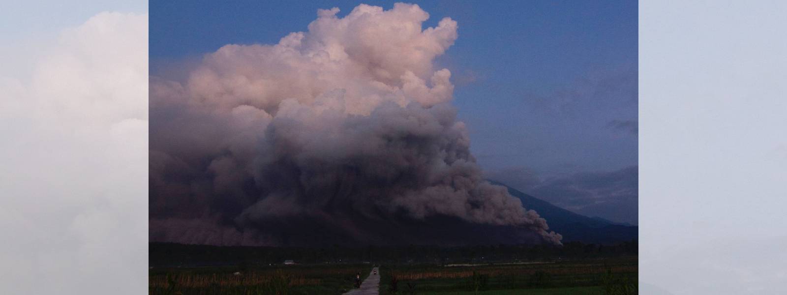Indonesia raises alert to highest level as volcano erupts on Java island